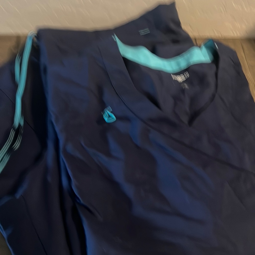 Navy blue scrubs. Top size 2xl bottom xl